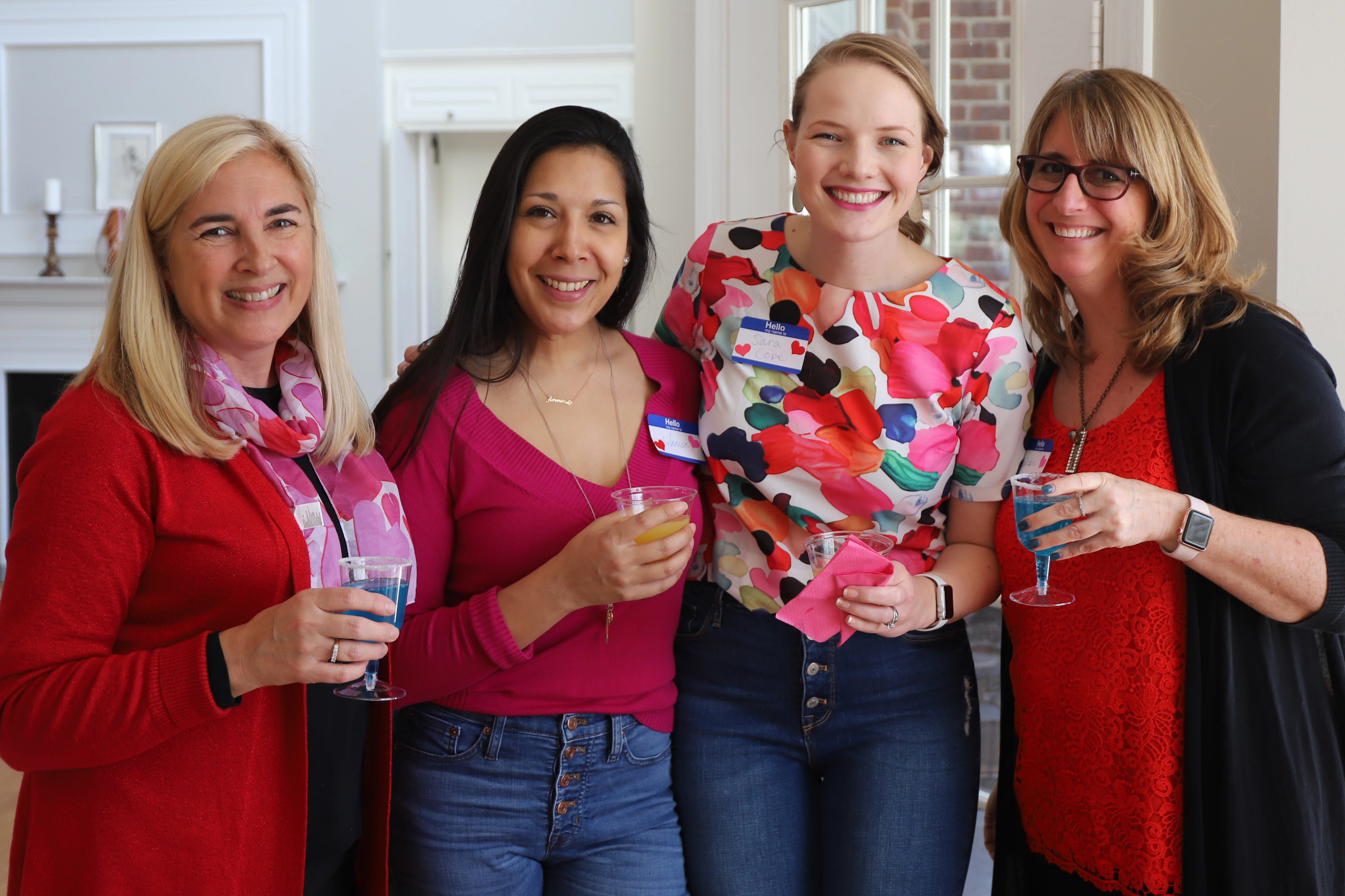 Alumnae in red shirts celebrate galentines day together