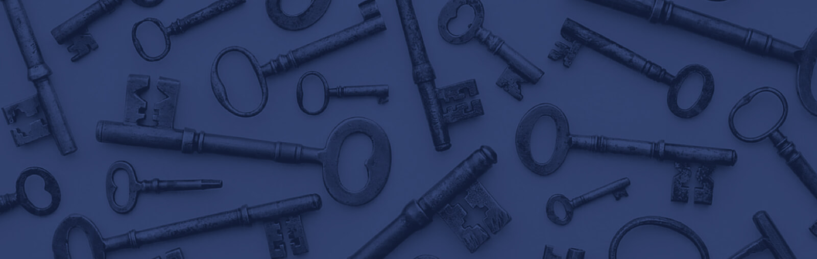 A blue banner image hero of vintage keys.